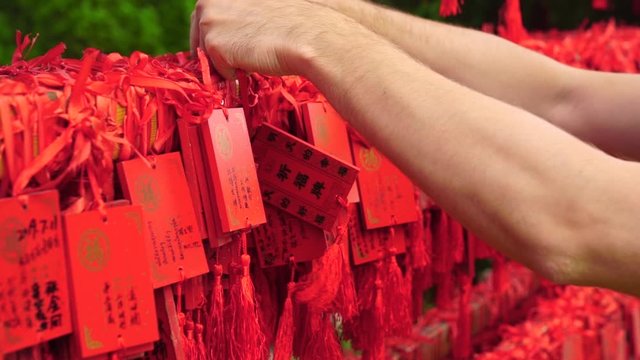 Guangzhou / China-October 20 2019 : Chinese Red wish tablets with hieroglyphs