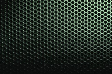 Hexagon mesh grill metal shading with holes texture background, geometric pattern, steel materials of speaker cover in dark green tone 