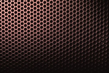 Hexagon mesh grill metal shading with holes texture background, geometric pattern, bronze materials of speaker cover in dark tone