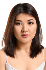 Fototapeta premium Portrait of young Asian woman on white background
