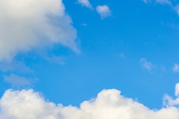 Fototapeta premium Blue sky background with white clouds