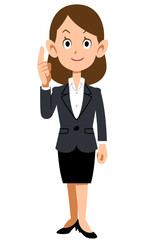 人差し指をたてるスーツの女性の全身