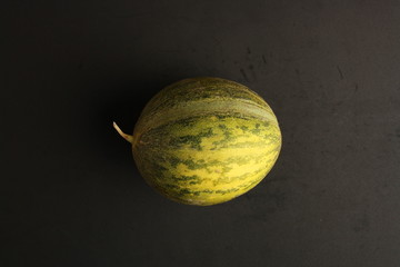 delicious melon grown in Spain on colorful background