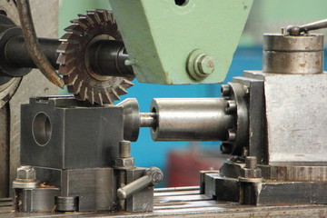 Сutting on Metal-removal milling machine tool close up, metal-cutting tools