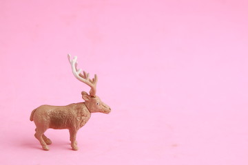 reindeer toy in color background