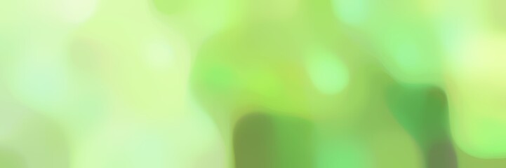 blurred bokeh iridescent horizontal background with tea green, moderate green and yellow green colors space for text or image