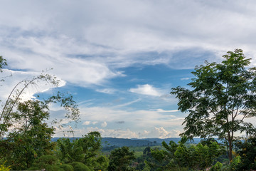 beautiful blue sky high peak mountains mist fog wildlife green forest at Khao Koh, Phu Tub Berk, Phetchabun, Thailand  guiding idea long weekend for backpacker camping campfire relaxing hiking