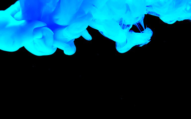 Stylish modern technology background. Watercolor ink in water.  Fantastic space blue abstract background.