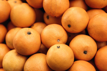 Tasty ripe fresh oranges background. Useful vitamins food