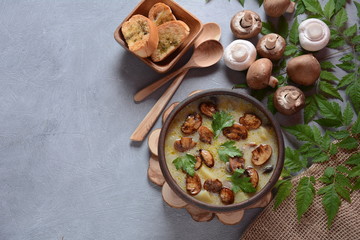 Delicious soup with mushrooms champignon and potato.Creamy Chanterelle Soup .Nordic cuisine. Vegan soup