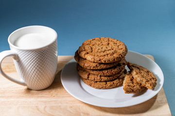 cookies with chocolate and a glass of milk