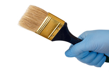 Woman holding painter brush on a white isolated background. Repair tool.