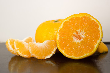 Fototapeta na wymiar orange on a white background with slices