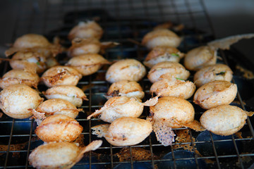 Knmcrk sweet dessert in Thai style, make food on a pan, made from coconut milk with sugar and flour