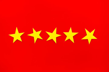 Customer experience concept. Estimate service quality. Five stars on red background top-down copy space