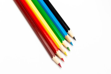 Colorful wooden pencils on a white background