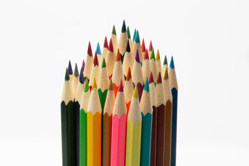 Colorful wooden pencils on a white background