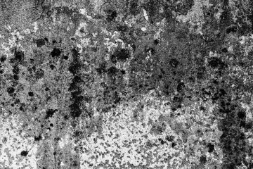 Texture of a concrete wall with cracks and scratches which can be used as a background