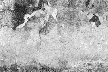 Texture of a concrete wall with cracks and scratches which can be used as a background