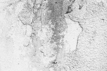 Texture of a concrete wall with cracks and scratches which can be used as a background