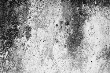Fototapeta na wymiar Texture of a concrete wall with cracks and scratches which can be used as a background