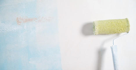 oller stands against the wall. Renovation