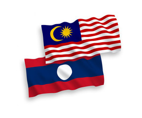 Flags of Laos and Malaysia on a white background