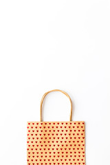 Shopping concept. Paper bag on white background top-down copy space
