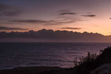 Obraz premium Landscape sea in Cyprus. View of the coast, calm sea and sky with a large cloud along the horizon