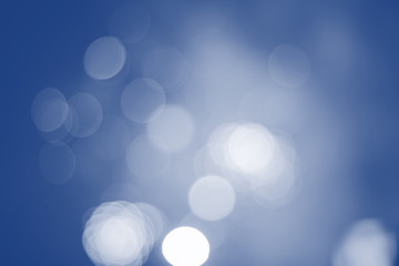 Defocused festive lights in classic blue. Can be used as background