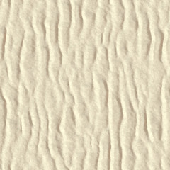 Seamless and photo realistic texture of sandy surface. View from above