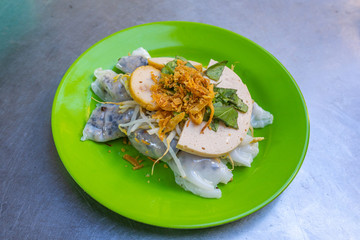 Plate of fresh cooked Vietnamese steamed rice rolls- Banh Cuon