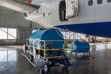 Aircraft vacuum toilet service. Maintenance of aircraft lavatories