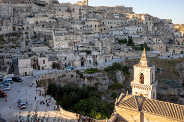Obraz premium View of the Sassi di Matera a historic district in the city of Matera, well-known for their ancient cave dwellings. Basilicata. Italy