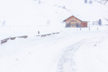 Fototapeta na wymiar In the storm. Winter Chills in Riva di Tures. Italy