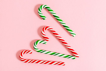 Christmas Lollipop cane on pink background