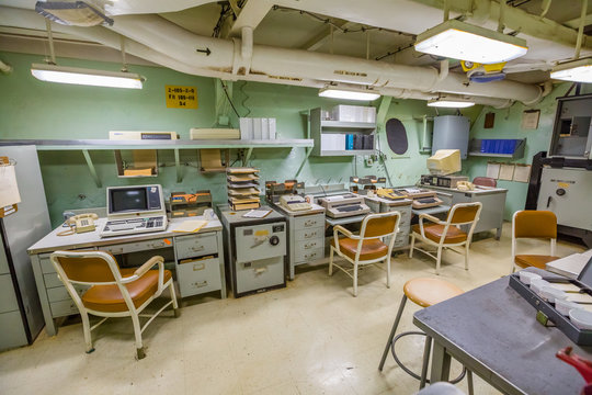 HONOLULU, OAHU, HAWAII, USA - AUGUST 21, 2016: big room with computers from 1980s of Battleship Missouri at Pearl Harbor. The end World War II was signed on this warship.