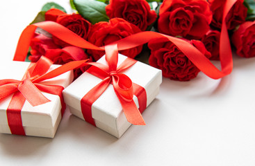 Red roses and gift boxes