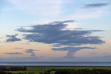 Naklejka na ściany i meble Impressive skies over Friesland as seen from the island of Terschelling .