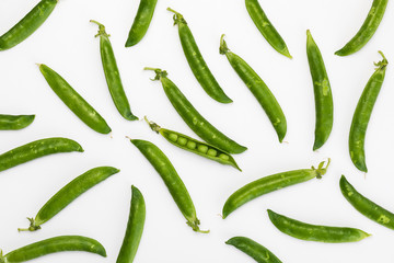 Green, tender, fresh and raw peas. Peas texture isolated on white background.