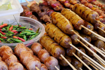 Trendy lifestyle of selling well cooking many kind of street food such as seafood, noodle, roasted pork, meat and chicken ball always found in Bangkok, Thailand and have space for write wording