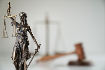 Law symbol composition. Gavel of the judge, Themis statue and scale of justice on off-white...