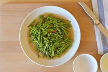 Stir-fried mimosa with oyster sauce.