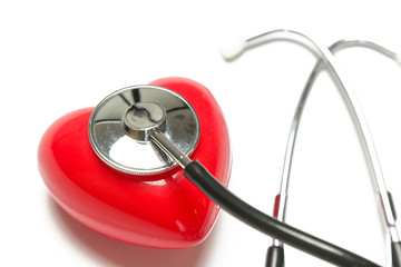 Red heart and a stethoscope isolated on white background