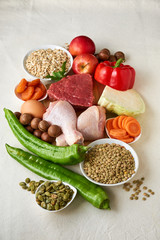 Various products for healthy balanced diet on a light background