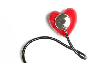 Red heart and a stethoscope isolated on white background