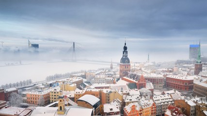 Areal view on Riga cityscape in fog, Latvia
