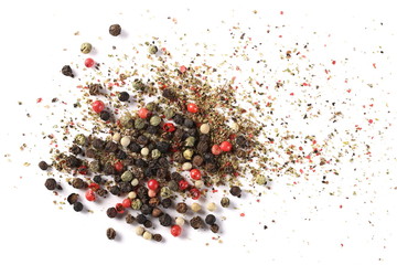 Colorful mixed pepper grains with crushed flakes, isolated on white background