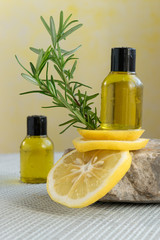 Bottles with essential lemon oil. Healthy natural beauty treatment