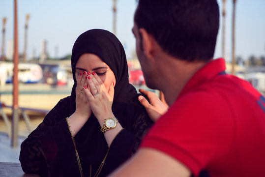 Young Arab Woman Crying In Cafe. Relationship Problems.